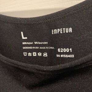 Brand new Empetua black camisole that will smooth out any unwanted bulges.
